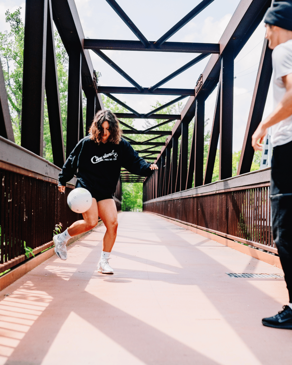 lauren on a bridge with a ball lauren on a bridge with a ball